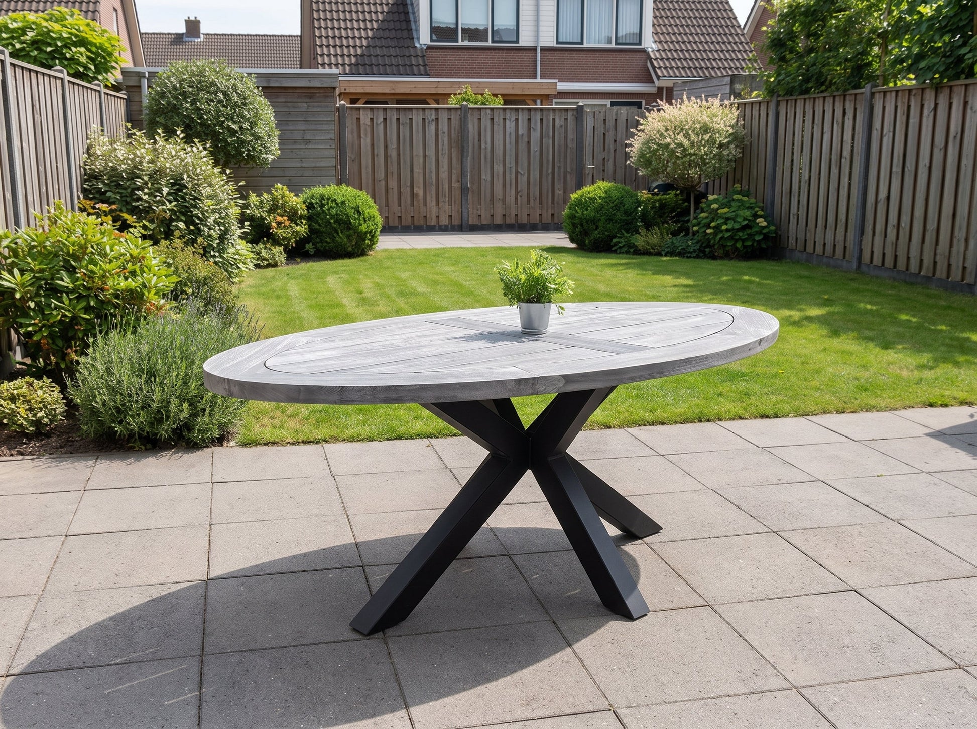 Bixley Ovale Tuintafel 240 cm - Acacia in einem stimmungsvollen Garten - Outnest Gartenmöbel