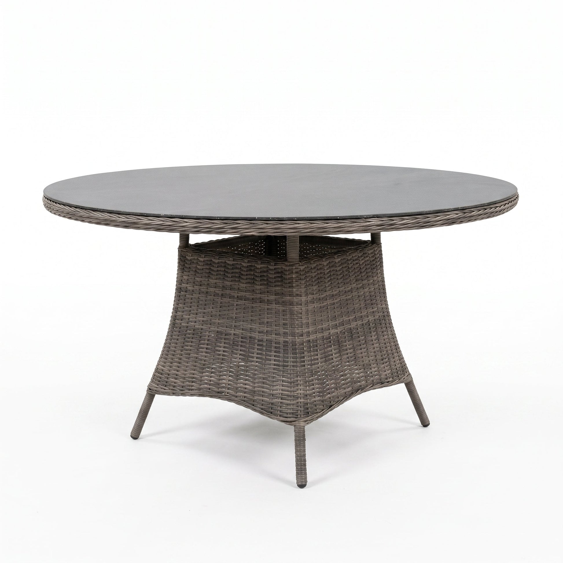 Brasil Ronde Tuintafel 120 cm - Spraystone / Kobo Grey in einem stimmungsvollen Garten - Outnest Gartenmöbel