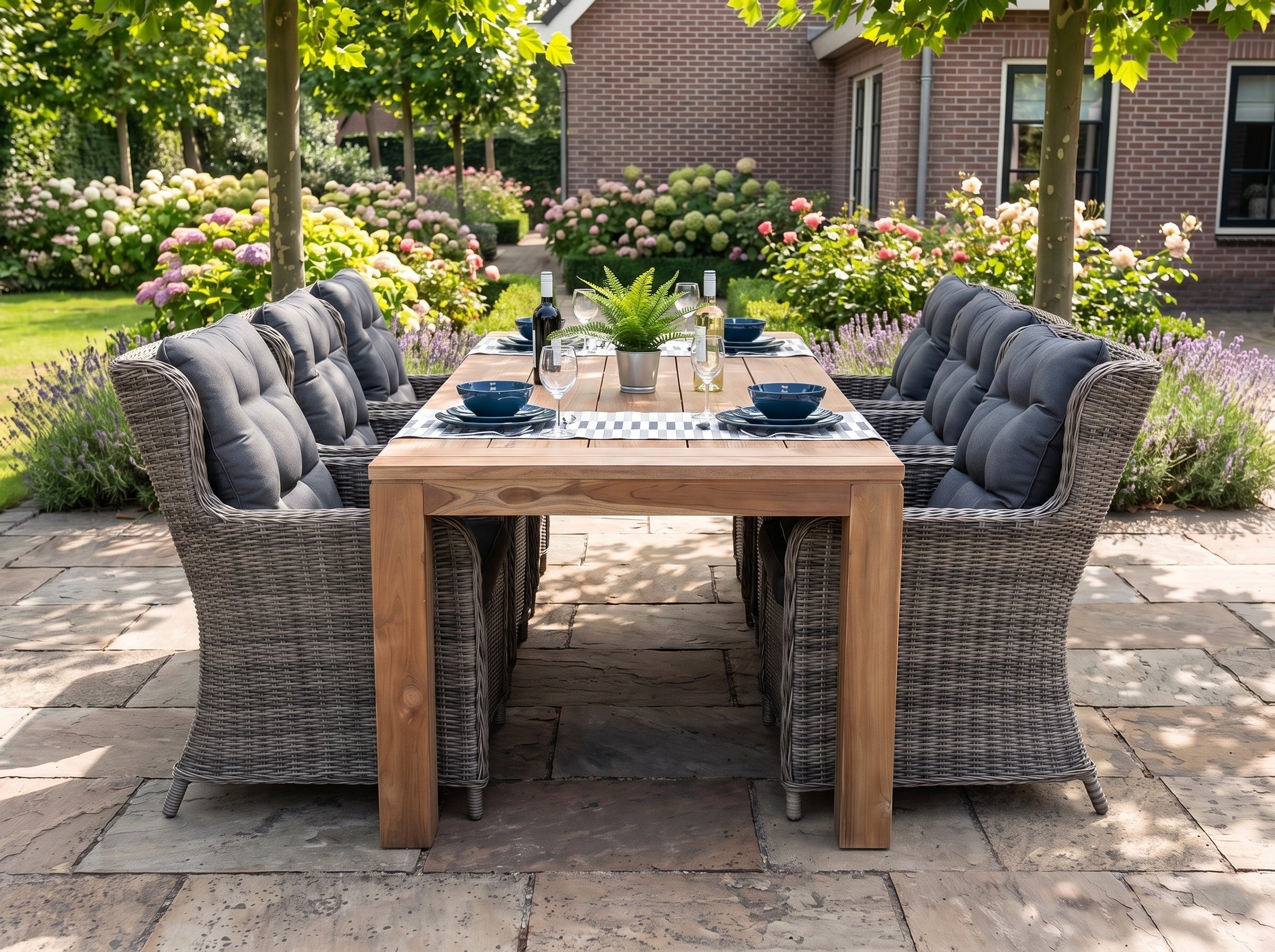 Cancun-Delano Tuinset 6 Personen - Teak / Kobo Grey in einem stimmungsvollen Garten - Outnest Gartenmöbel