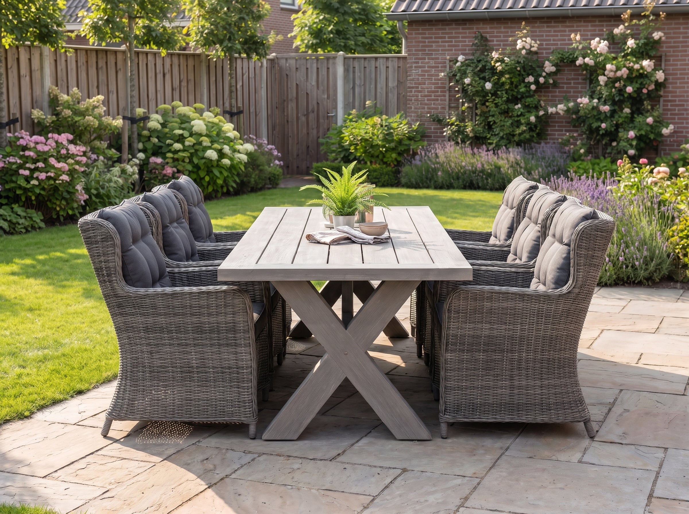 Norwich-Delano Tuinset 6 Personen - Acacia / Natural Grey in einem stimmungsvollen Garten - Outnest Gartenmöbel