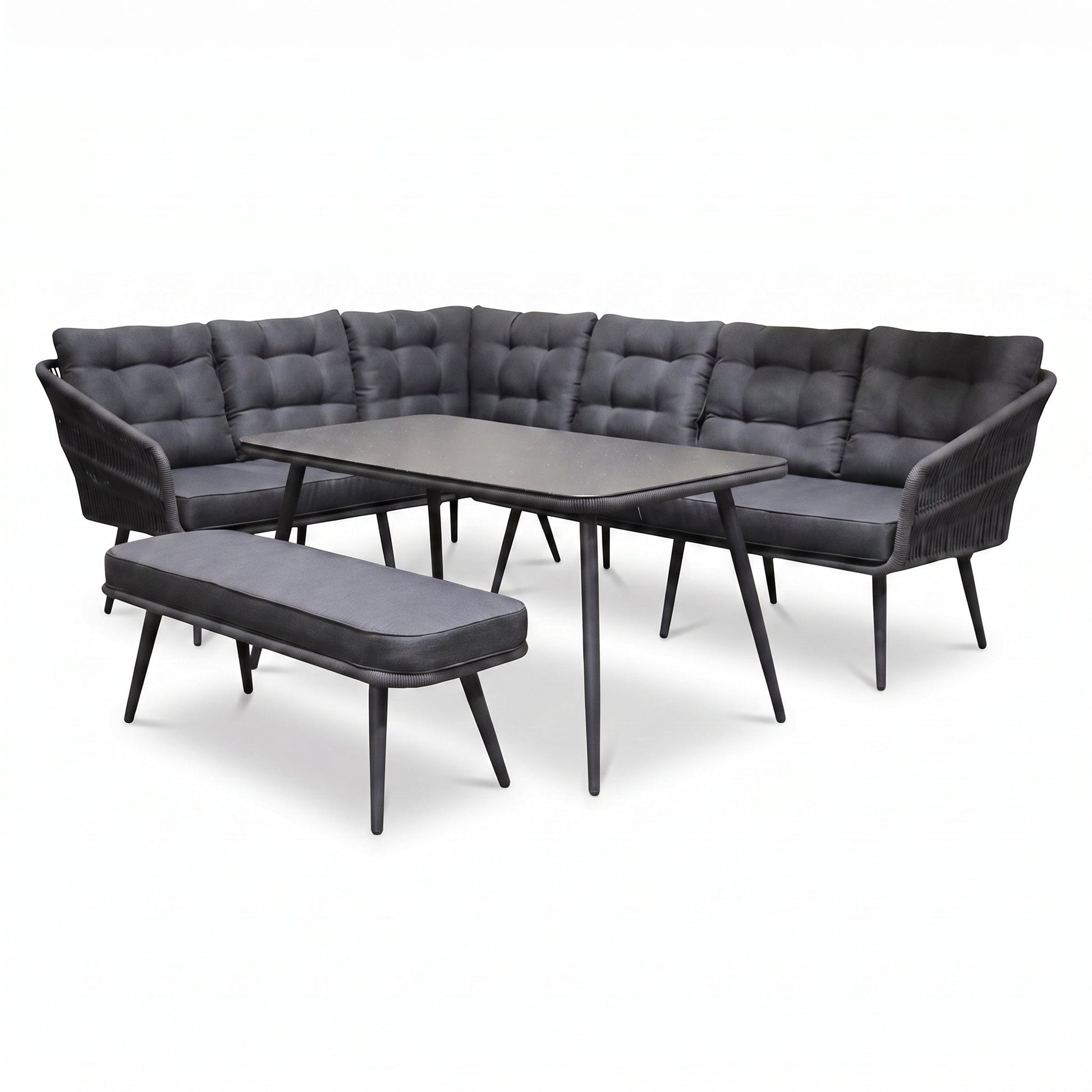 Positano Dining Loungeset - Anthracite (links) in einem stimmungsvollen Garten - Outnest Gartenmöbel