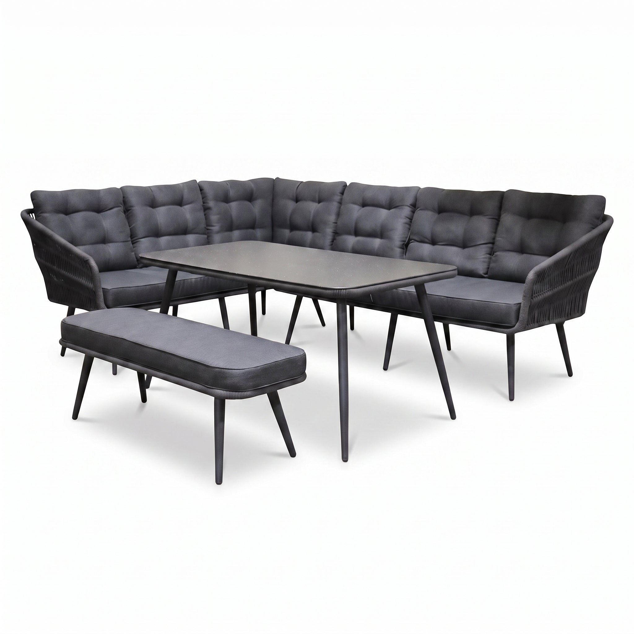 Positano Dining Loungeset - Anthracite (links) in einem stimmungsvollen Garten - Outnest Gartenmöbel