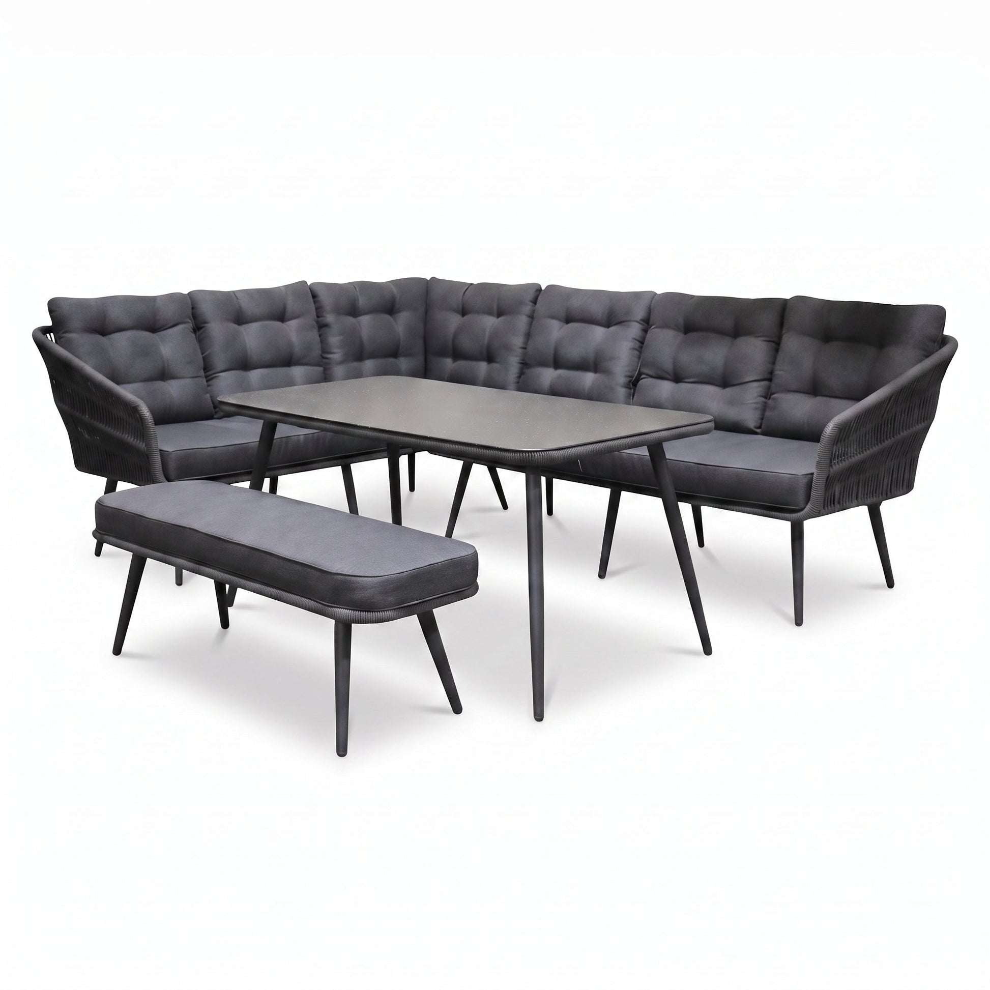Positano Dining Loungeset - Anthracite (links) in einem stimmungsvollen Garten - Outnest Gartenmöbel
